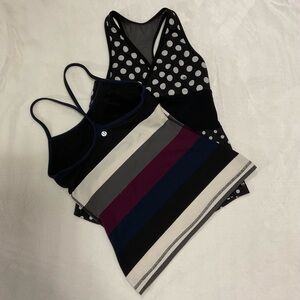 Pair of lululemon athletica Black polka dot and Multicolor Tank Tops